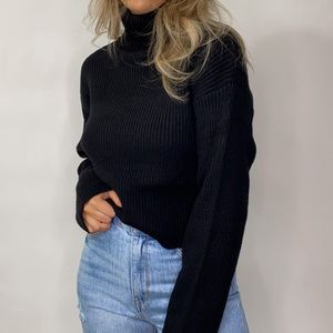 Cropped black turtleneck sweater